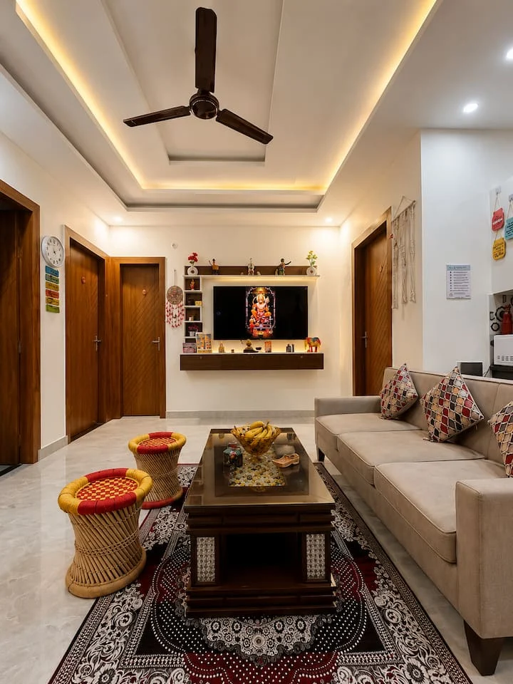 Living room with comfortable seating at Advaitam Ganga and Hill View