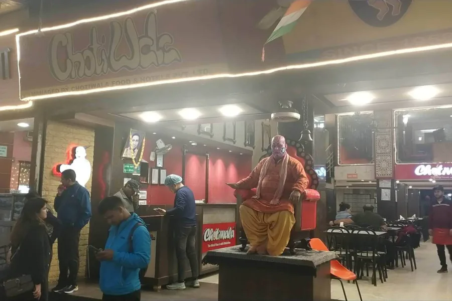 Chotiwala restaurant entrance and traditional mascot in Rishikesh