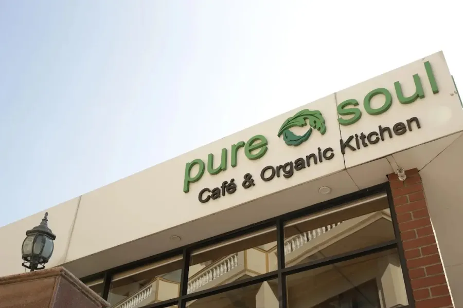 Pure Soul Cafe and Organic Kitchen storefront sign in Tapovan