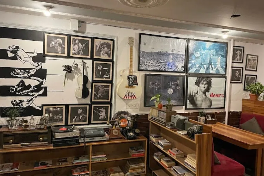 Beatles memorabilia and retro music decor inside The 60's Cafe in Rishikesh